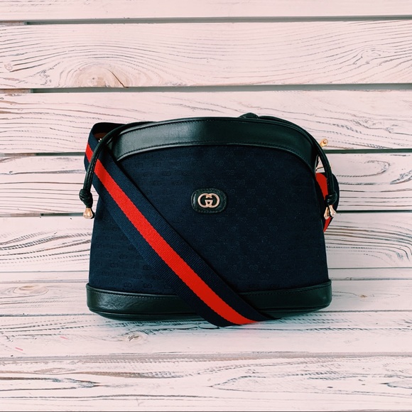 Gucci Handbags - VINTAGE GUCCI NAVY MONOGRAM DRAWSTRING BUCKET BAG